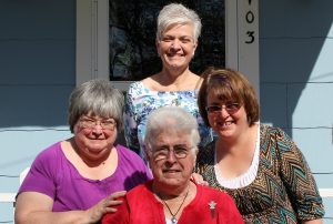 My mom, my two older sisters and myself